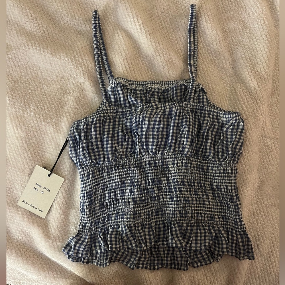 This is from Japna, size XS! Never worn, got it as a present.